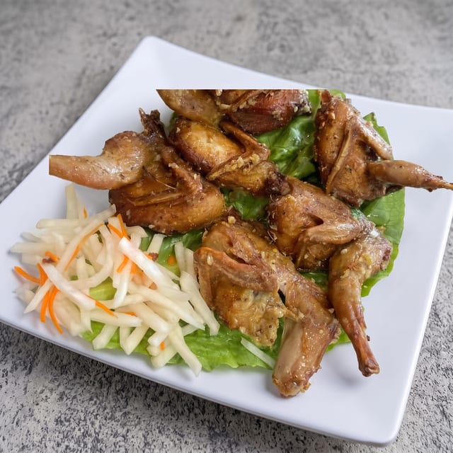 A7. Crispy Garlic Butter Quails.