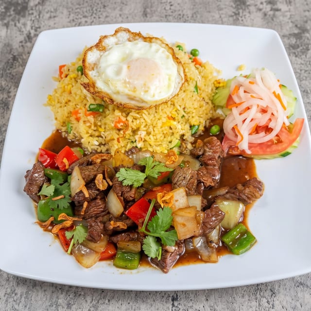 C5. Shaken Beef Ribeye Rice Plate.